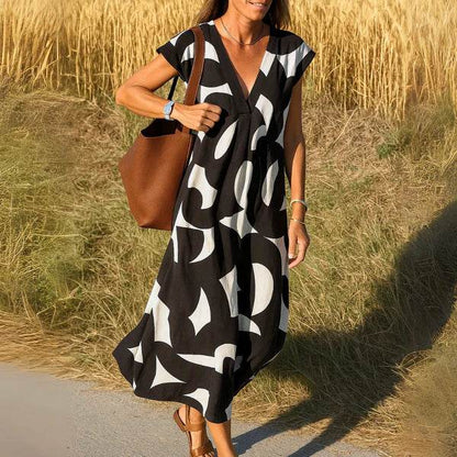 Eva™ | Flowing dress with V-neck
