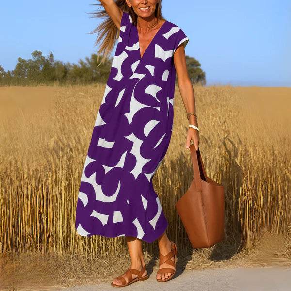Eva™ | Flowing dress with V-neck